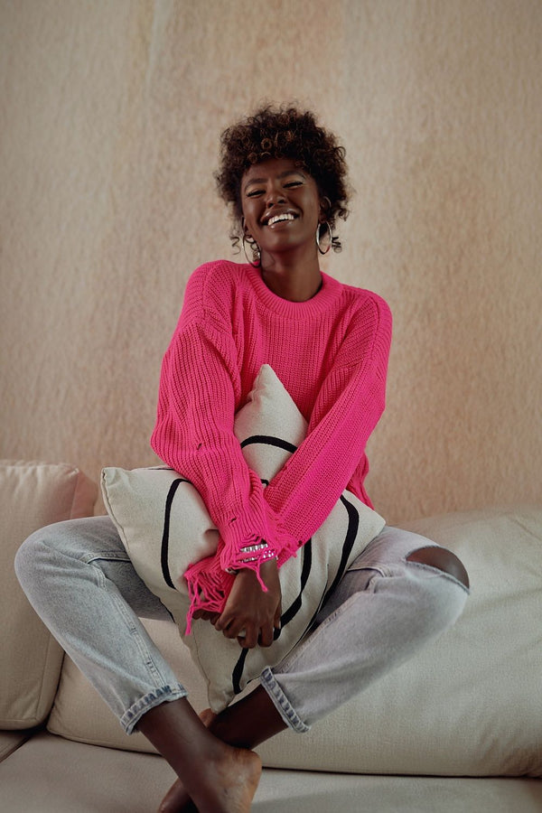 Short oversized sweater with holes, neon pink