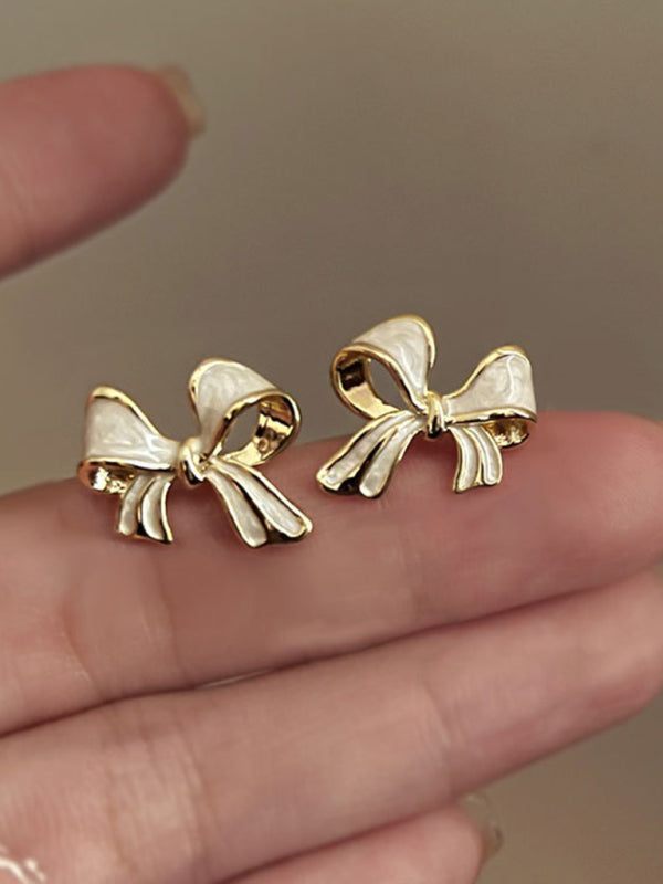 Women's enamel bow pearlescent sweet earrings