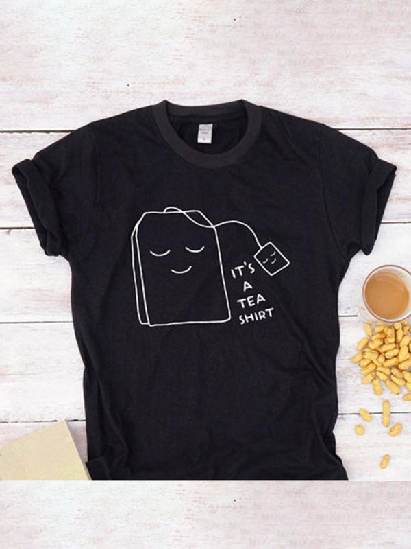 T-shirt con bustina di tè grafica da donna con volto sorridente 