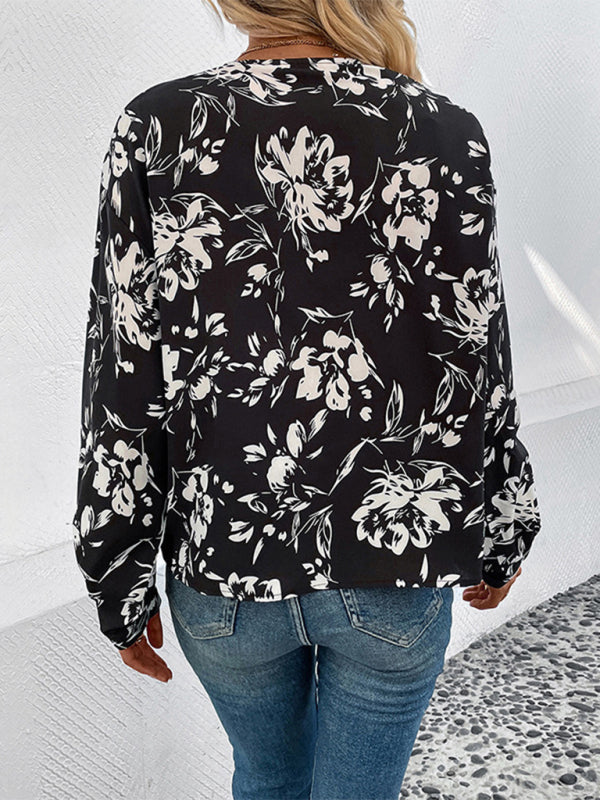 Nuova camicia da donna a maniche lunghe con risvolto stampato a fiori bianchi e neri 